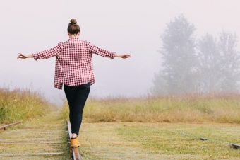 young-girl-balancing-railway